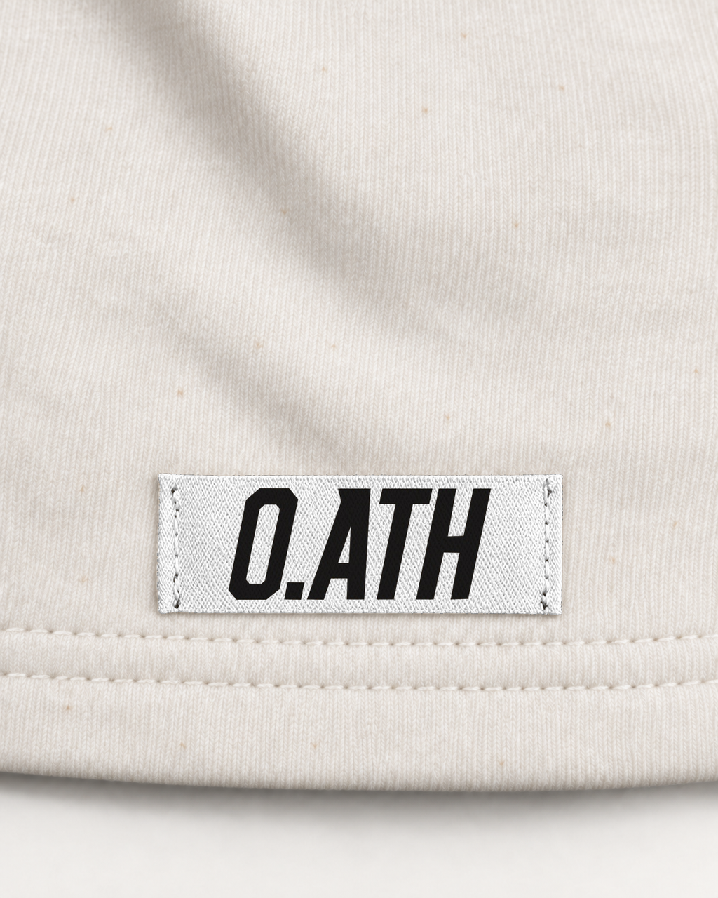 O.ATH Original Form hemp shorts in Natural — woven label and fabric detail