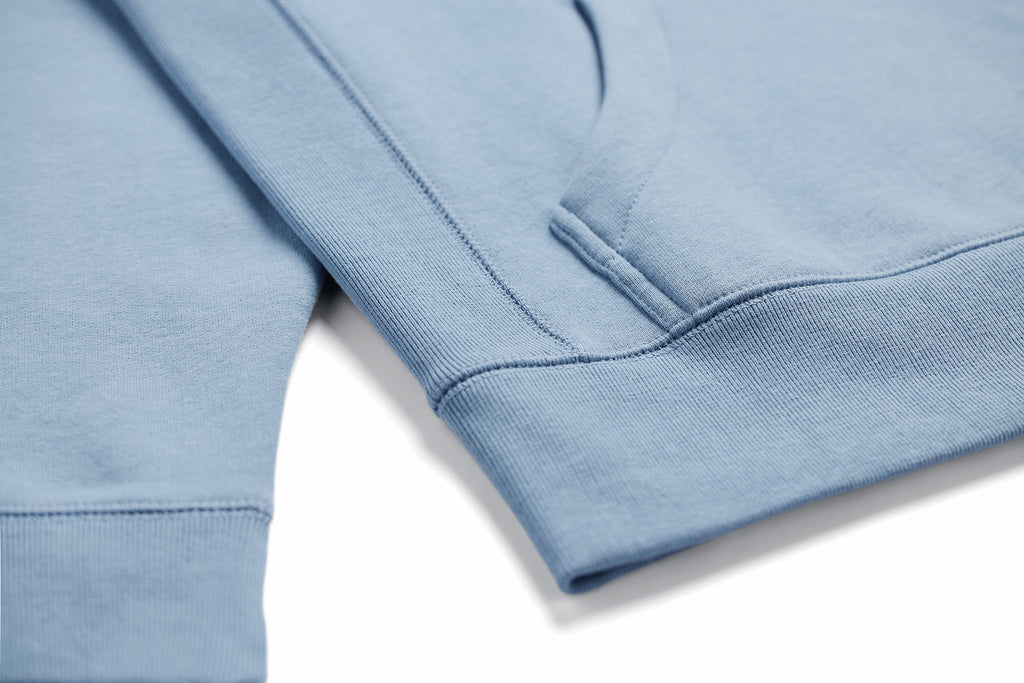 Cloudy Blue O.ATH Original Form Hoodie kangaroo pocket, tonal seams and ribbed hem