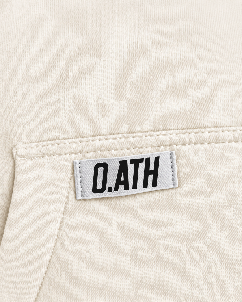 O.ATH Original Form hoodie in Natural — woven label and fabric detail